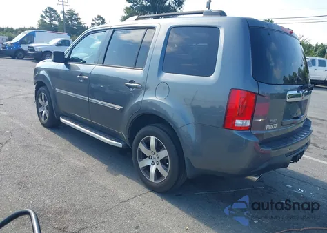 2012 Honda Pilot Touring z USA, uszkodzony, nr VIN 5FNYF3H93CB028547